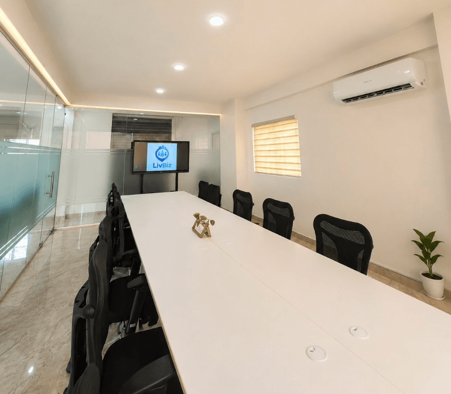 LivBiz conference room with long table and glass walls